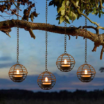 Outdoor waterproof solar hanging lantern, rusty iron ball candlestick, with sparkling solar tea candle, perfectly rechargeable solar light, suitable for backyard, patio, garden, fence, tree decoration - 4 pieces