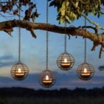 Outdoor waterproof solar hanging lantern, rusty iron ball candlestick, with sparkling solar tea candle, perfectly rechargeable solar light, suitable for backyard, patio, garden, fence, tree decoration - 4 pieces
