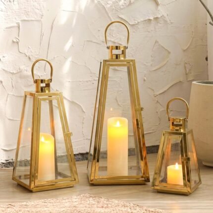 Three-piece stainless steel candle lantern set, 21/16/11 inch tall, metal outdoor candlestick, decorative hanging lantern with tempered glass, suitable for family living room, parties, indoor and outdoor events (gold triangle)